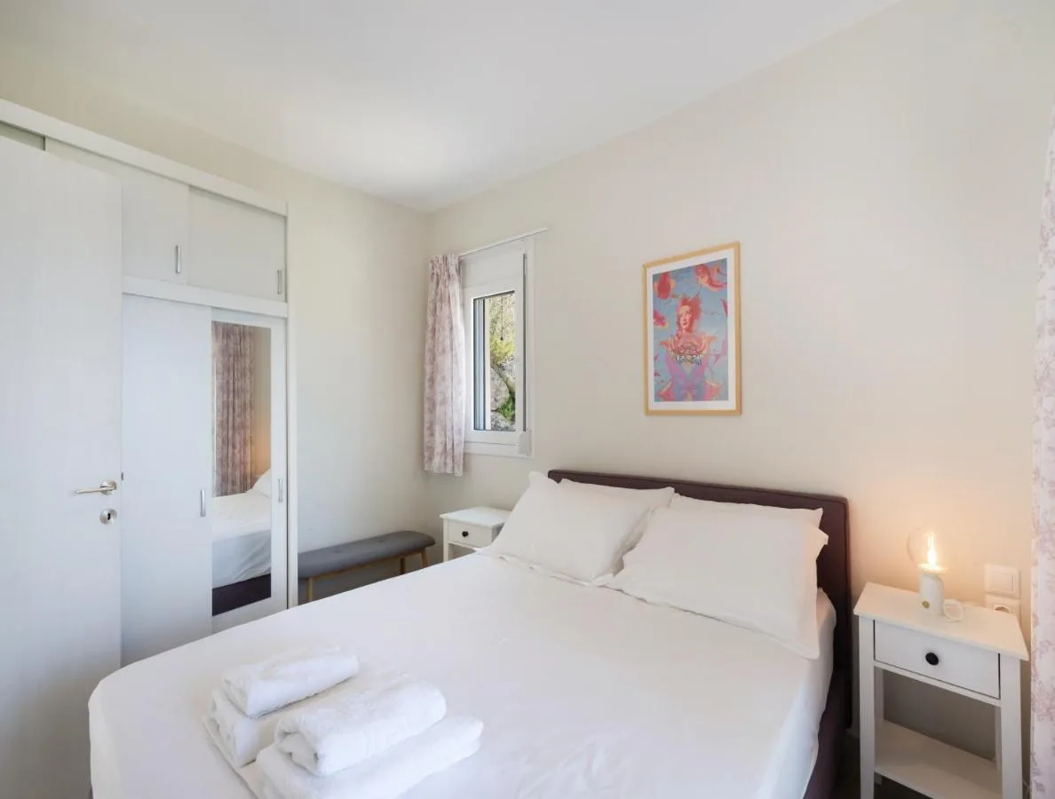 Bedroom with a double bed and built-in wardrobe
