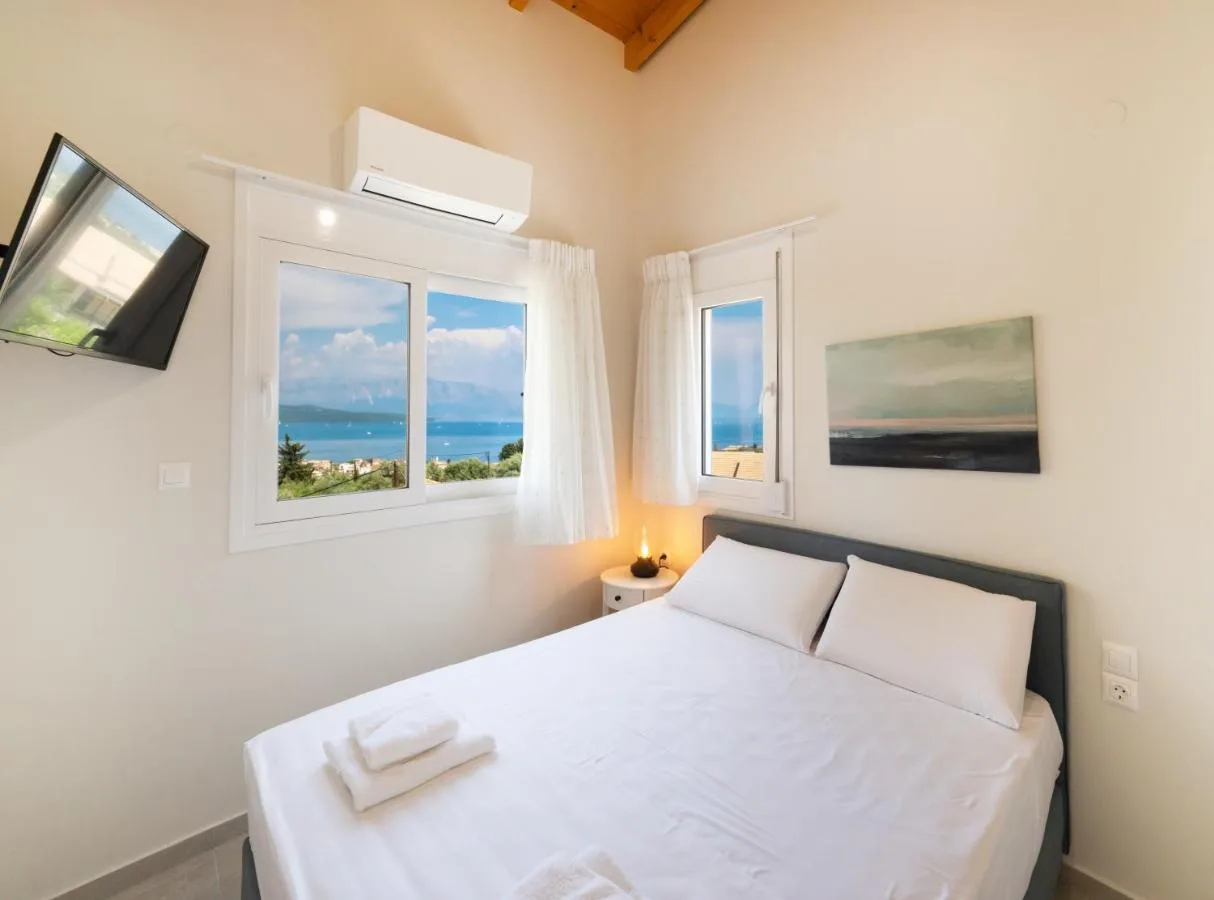 Bedroom with sea view through the window