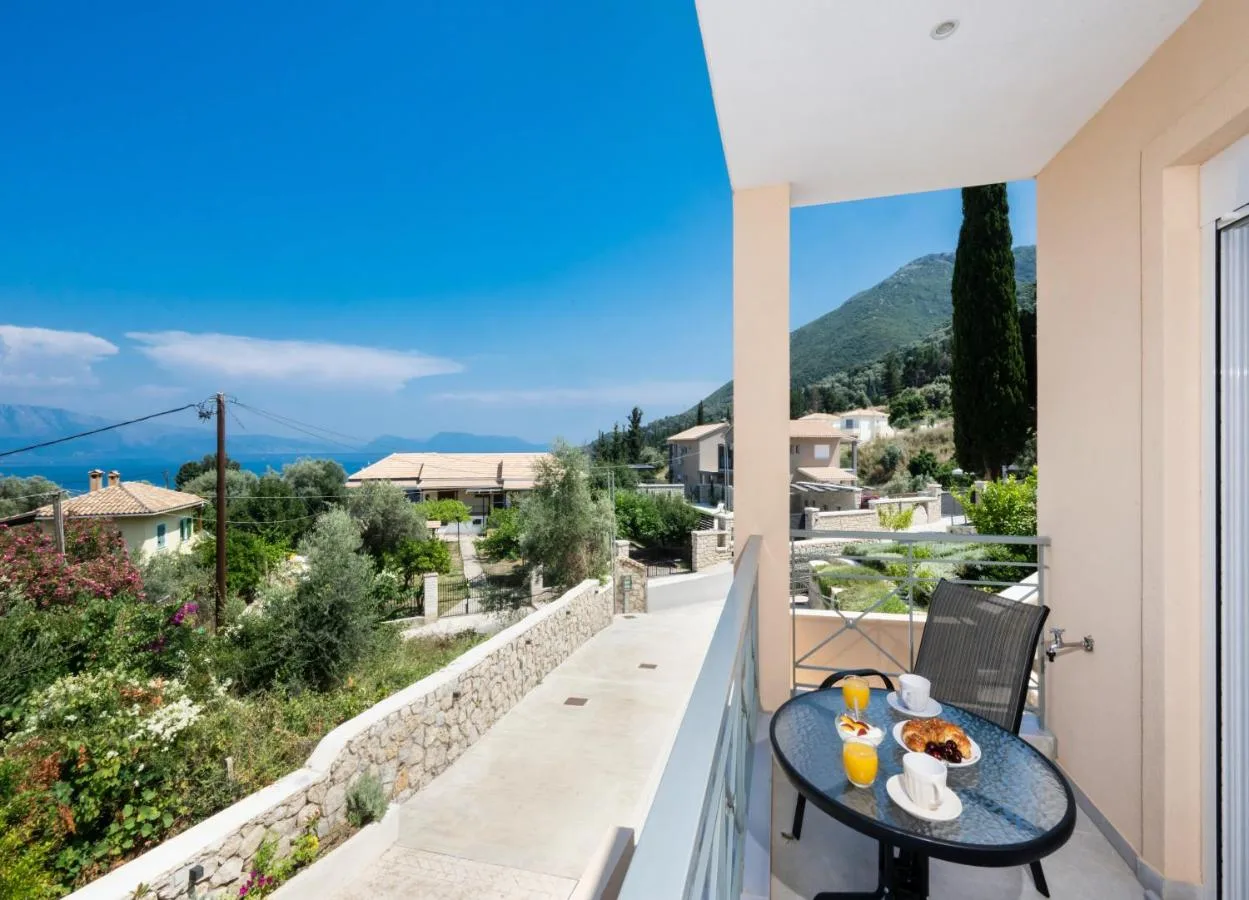 Compact balcony setup with breakfast table and view