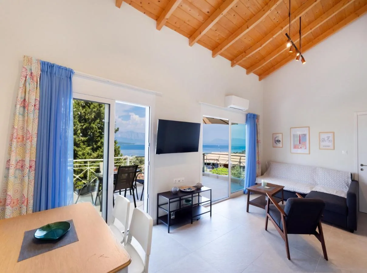 Living room with timber ceiling and open sea-side light