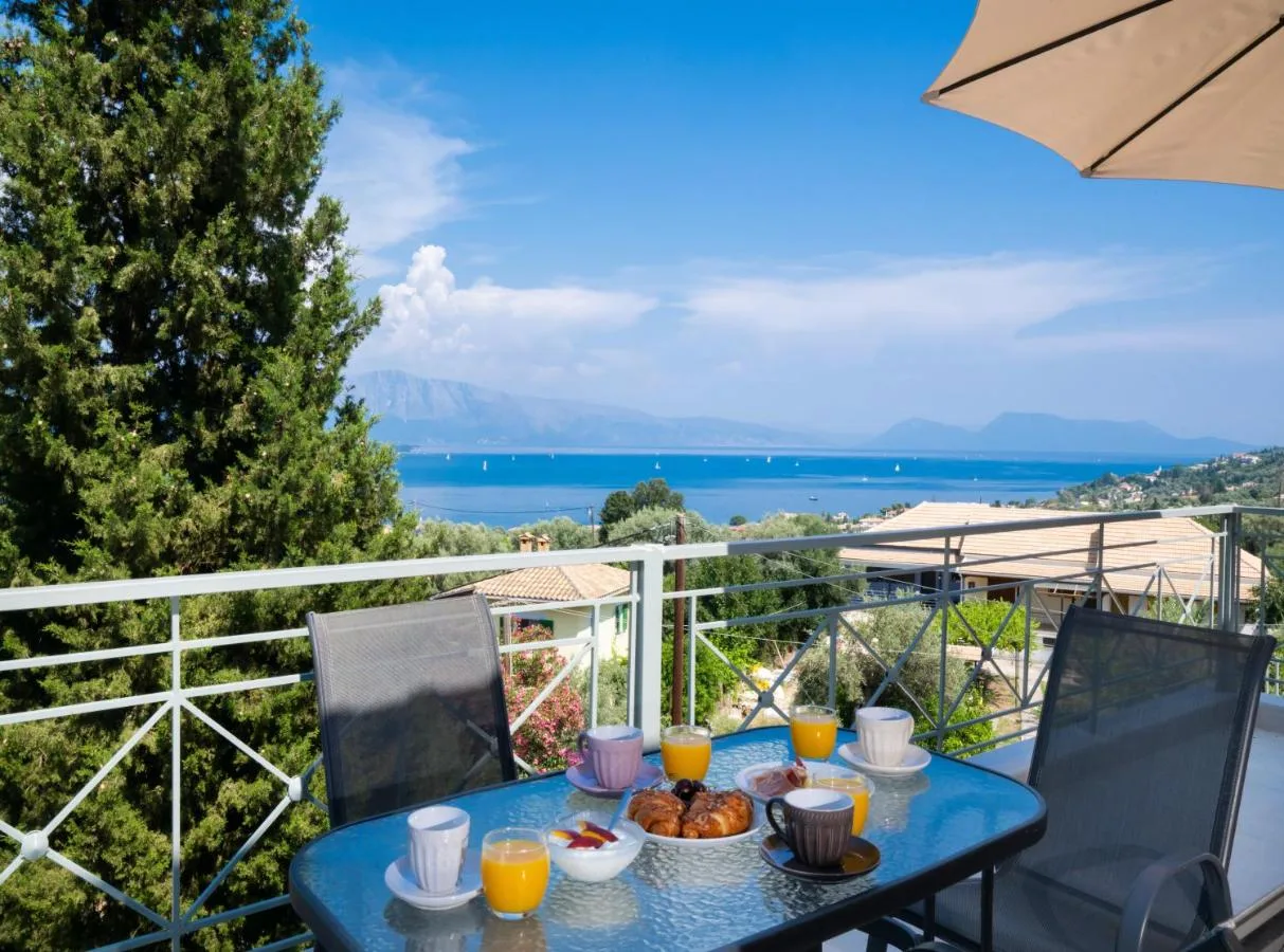 Balcony breakfast table looking toward the water