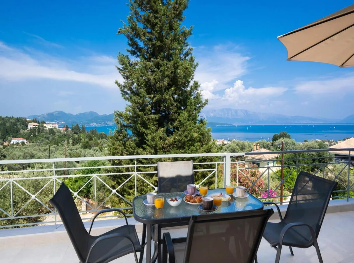 Terrace table by the railing with sea view